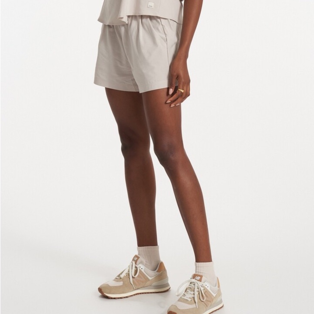 Vuori Women's Athletic Shorts in neutral/light tan color